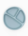 Blue silicone plate with three sections on a white background