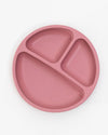 Pink divided plate on a white background