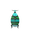 Colorful beetle-shaped toy on a white background