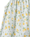 Fabric with lemon pattern on a light blue background