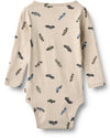 A long-sleeve baby bodysuit in beige with an all-over print of small vintage cars in blue, gray, and black, shown against a plain white background.