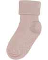 Beige sock with textured sole on a white background