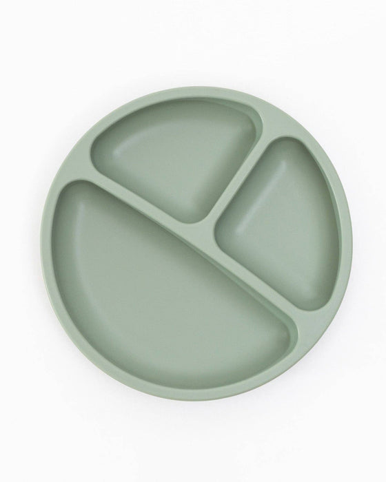 Green silicone plate with three sections on a white background