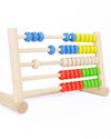 Wooden abacus with colorful beads on a white background