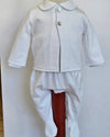 A white baby footed romper suit with a long-sleeve button-front cardigan jacket and matching pants, displayed on a mannequin against a plain white background.