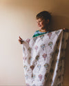 La La Lu Hot Air Balloon cotton muslin baby swaddle blanket in colourful watercolour design.