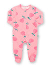 Pink baby onesie with fruit pattern on a white background