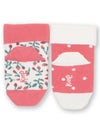 Pair of baby socks with festive design on a white background