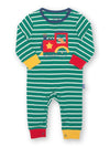 Green and white striped baby romper with a red train design on a white background
