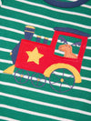 Children's shirt with a red train design on a green and white striped background