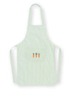 A light mint green apron with thin vertical pinstripes, featuring a front pocket with three embroidered orange carrots and green tops, set against a plain white background.