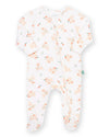 A baby footed sleeper in white with a light peach and orange bunny print, shown flat on a white background.