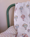 La La Lu Hot Air Balloon cotton muslin baby swaddle blanket in colourful watercolour design.