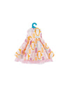 Dress with geometric pattern on a hanger against a white background