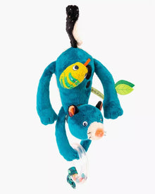  Blue plush toy with a yellow fish attachment on a white background