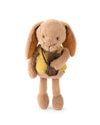 A plush toy rabbit standing against a plain white background. The rabbit is light tan with long floppy ears, holding a small brown camera and wearing a yellow vest.