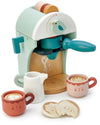 Toy espresso machine with cups and accessories on a white background