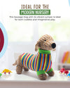 Toy dog in a colorful sweater on a shelf with toys around, text about modern nursery.