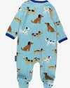 Baby onesie with dog pattern on a blue background