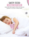 Child sleeping with a pink rattle, surrounded by safety testing information.