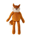 Stuffed toy fox with a white muzzle on a white background