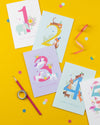 Five birthday cards with numbers 1 to 5 on a yellow background