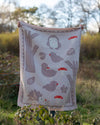 Little Green Radicals Folk Tales organic cotton knitted baby blanket, 100 x 75cm.