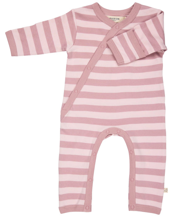Pink and white striped baby romper on a white background