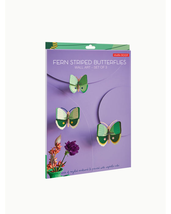 Packaging of fern striped butterflies wall art set on a purple background