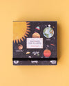A 100-piece puzzle box with an illustration of the solar system planets on a yellow background. The box is labeled with 'Discover the Planets' and has the brand 'Londji' printed on it.