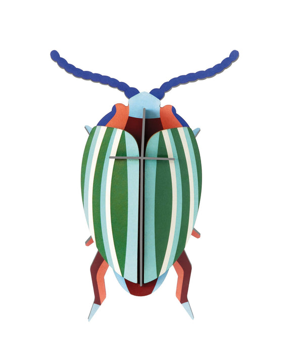 Colorful striped beetle toy on a white background