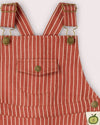 Red and white striped overalls with gold buttons on a white background