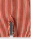 Red and white striped pants on a light gray background