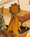 Little Green Radicals Golden Lion organic cotton muslin baby comforter.