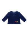 Navy blue cardigan with colorful 'ABC' letters on a white background