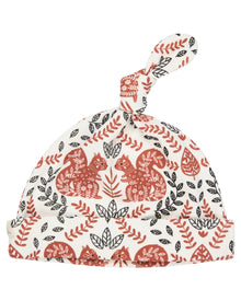  Baby hat with red squirrel pattern on a white background