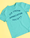 Turquoise t-shirt with 'Ice Cream Appreciation Society' text on a yellow background