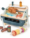 Toy barbecue set with various accessories on a white background