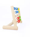 Wooden abacus toy with colorful beads on a white background