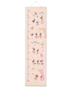 Growth chart with cartoon characters on a white background