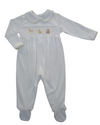 A white long-sleeve baby footed sleeper with a smocked chest, featuring a Peter Pan collar, delicate gold trim, and embroidered duck and teddy bear motifs on the chest.