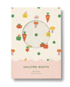 Baby wrap packaging with cartoon vegetables on a beige background, featuring the brand 'Halcyon Nights'.